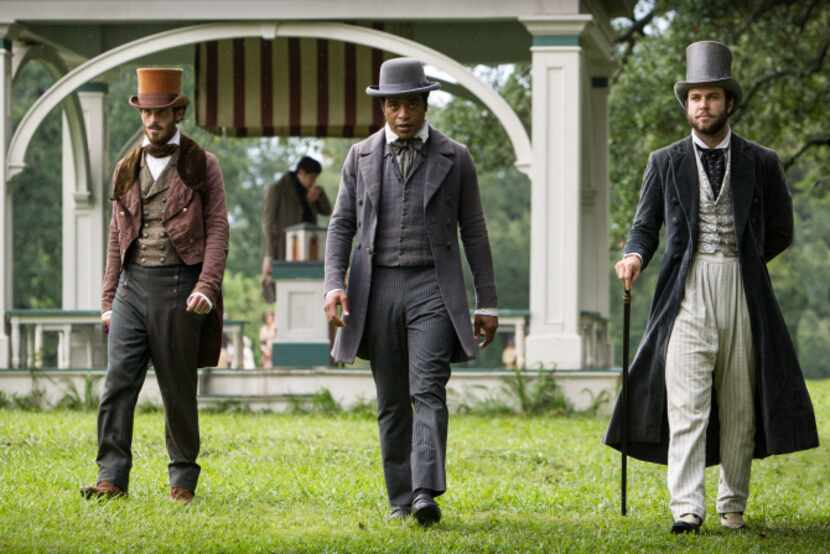 This image released by Fox Searchlight shows, from left, Scoot McNairy, Chiwetel Ejiofor,...