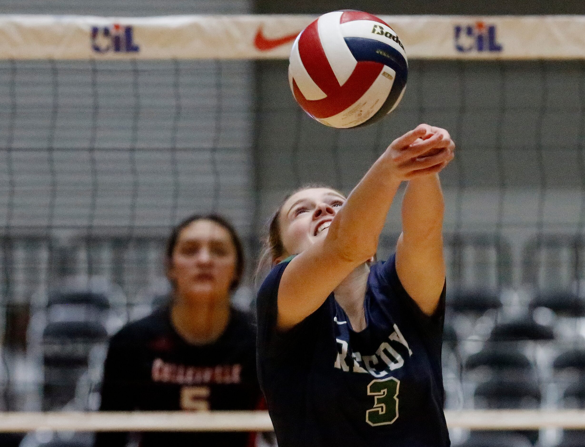 Reedy High School's Carter Fouche (3) keeps a point alive during game three as Colleyville...