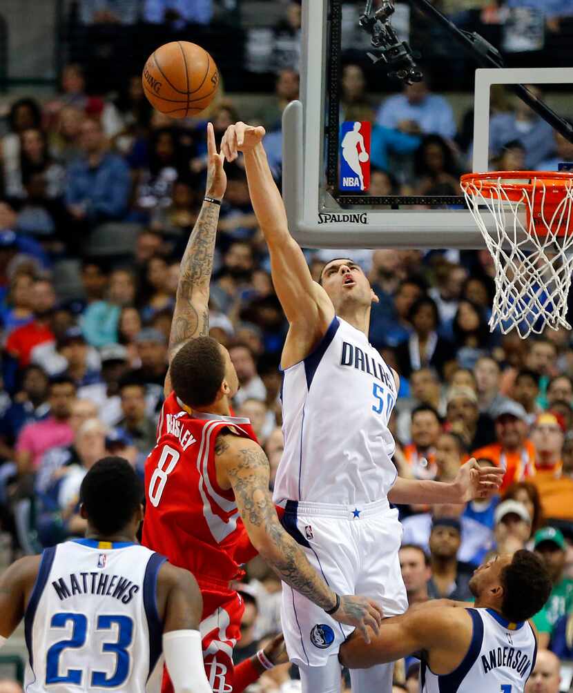 Dallas Mavericks center Salah Mejri (50) blocks a shot by Houston Rockets forward Michael...