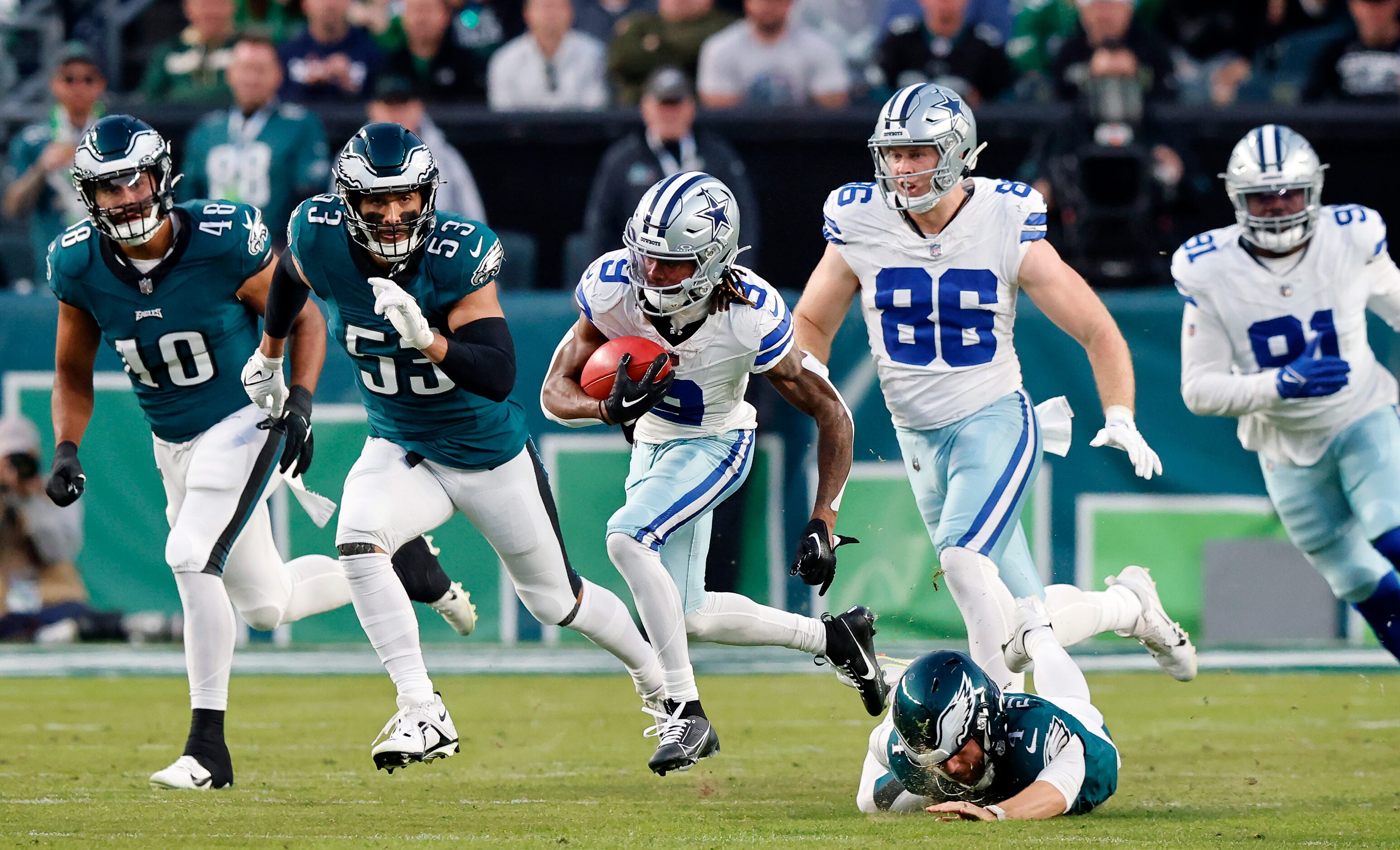 Dallas Cowboys wide receiver KaVontae Turpin (9) makes a big kick return in the first...