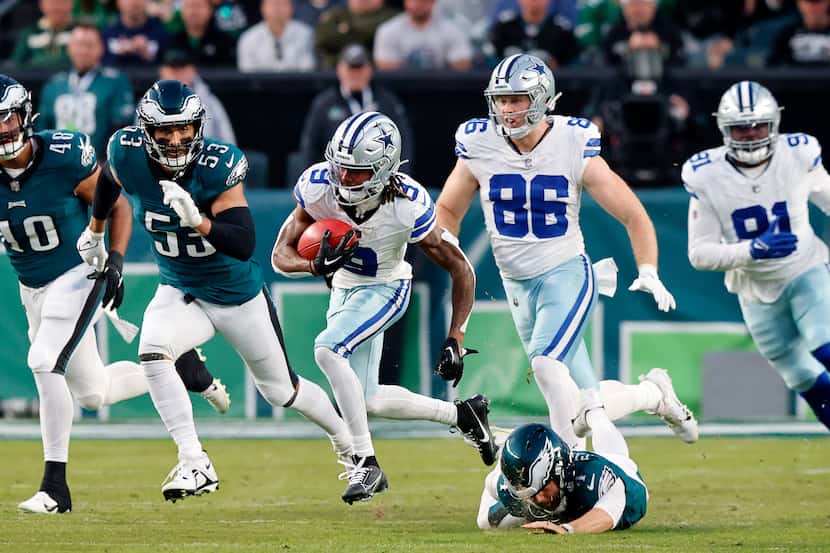 Dallas Cowboys wide receiver KaVontae Turpin (9) makes a big kick return in the first...