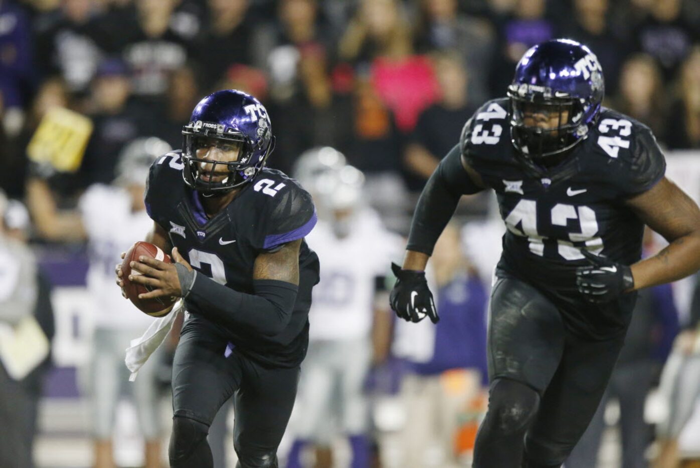 TCU quarterback Trevone Boykin (2) rushes the ball near the end zone in the third quarter...