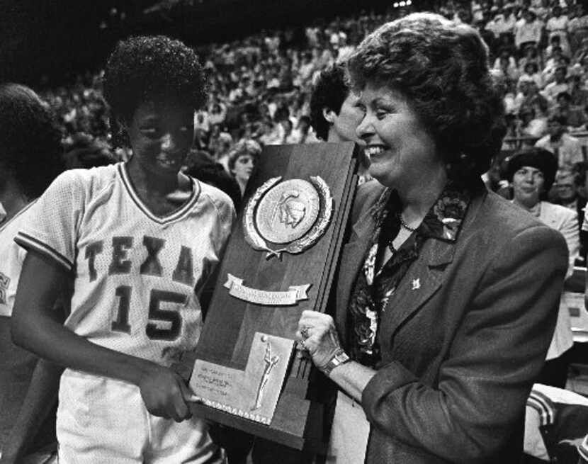 Annette Smith-Knight celebrates winning the 1986 national championship with head coach Jody...