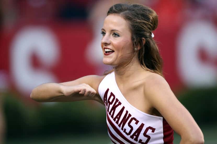 Oct 13, 2012; Fayetteville, AR, USA; Arkansas Razorbacks cheerleader performs during the...