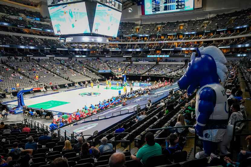 Dallas Mavericks mascot Champ watches from the stands during the second half of an NBA...