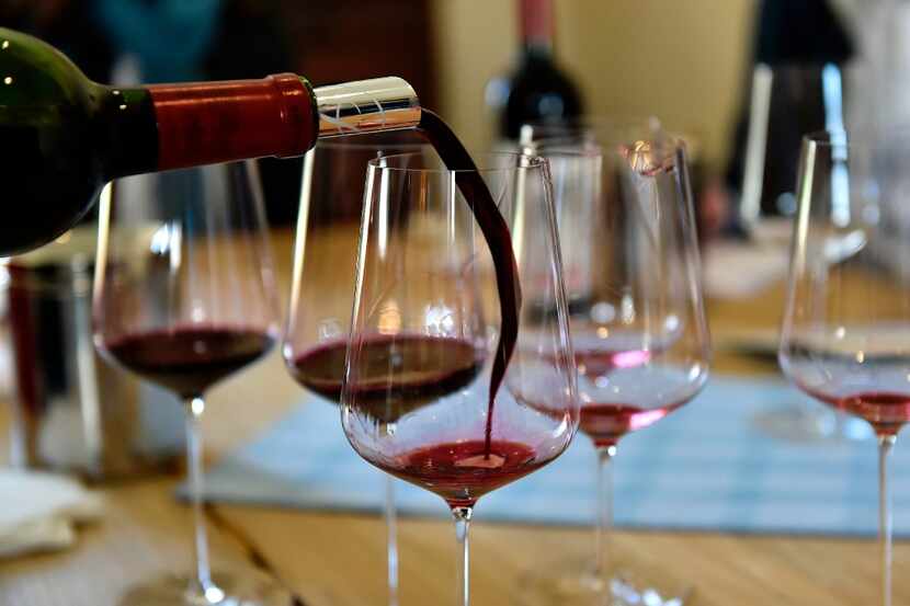 Wine is poured during a tasting of the 2016 vintage Bordeaux primeurs at Chateau La Lagune...