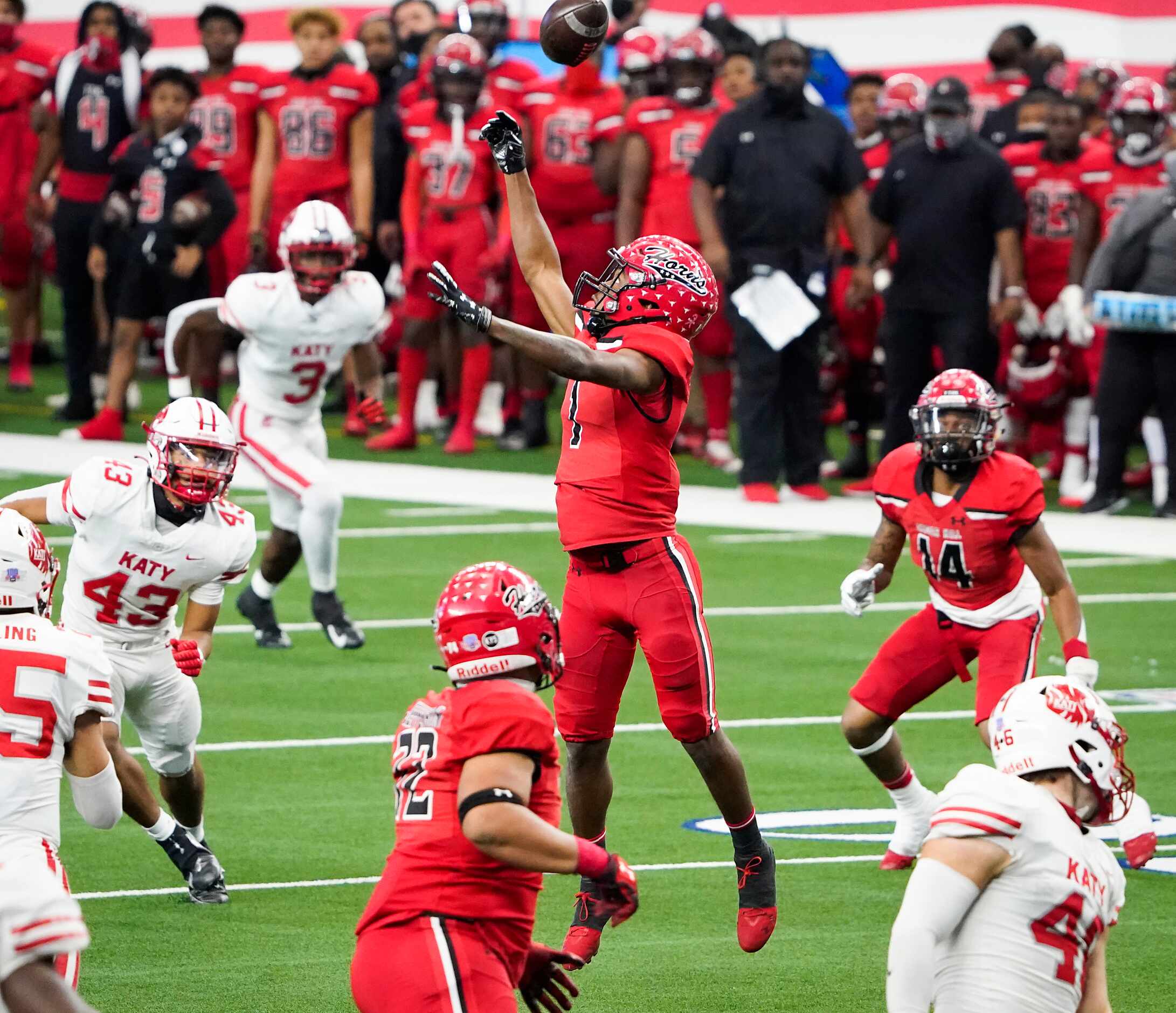 Cedar Hill wide receiver Anthony Thomas IV (1) has a pass go off his hands during the first...
