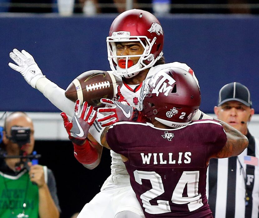 Texas A&M Aggies defensive back Priest Willis (24) breaks up a goal line pass of Arkansas...