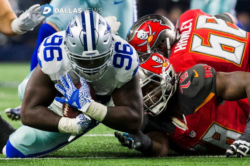 Dallas Cowboys defensive tackle Maliek Collins (96) recovers a fumble by the Tampa Bay...