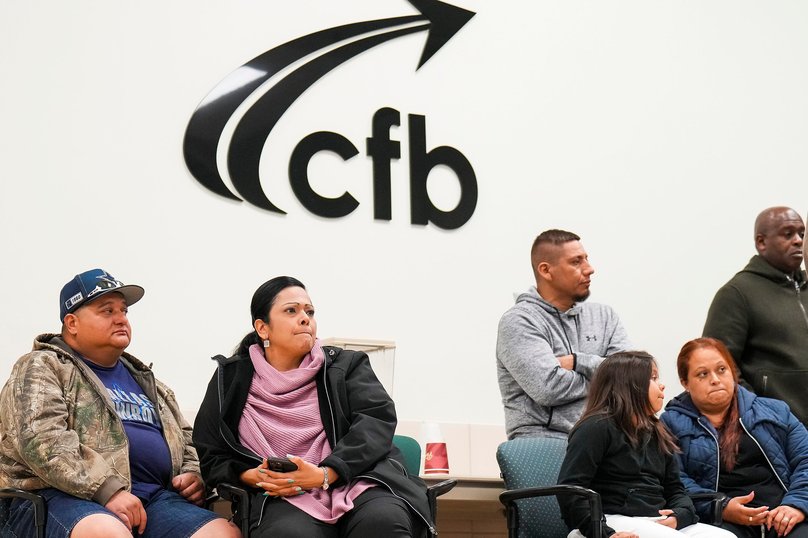 People in the audience listen to a presentation on fentanyl during a Student Health Advisory...