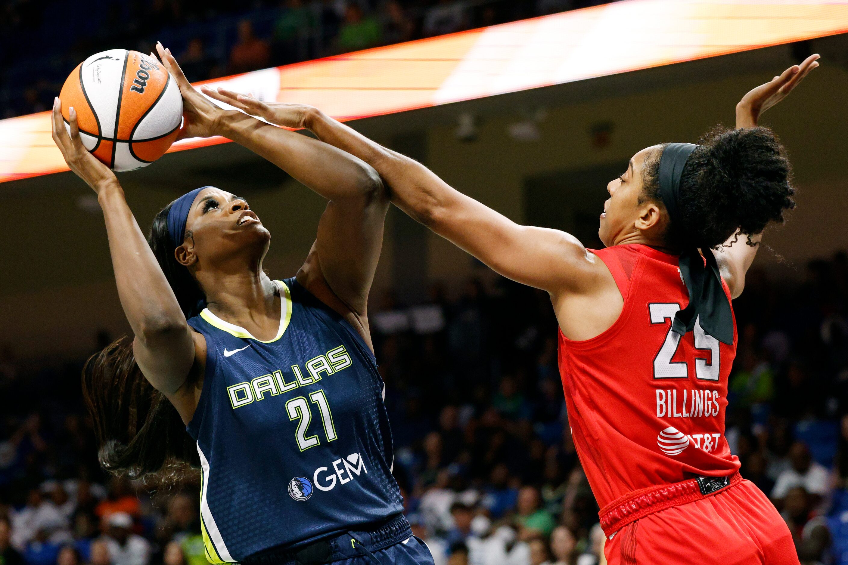 Dallas Wings center Kalani Brown (21) shoots over Atlanta Dream forward Monique Billings...