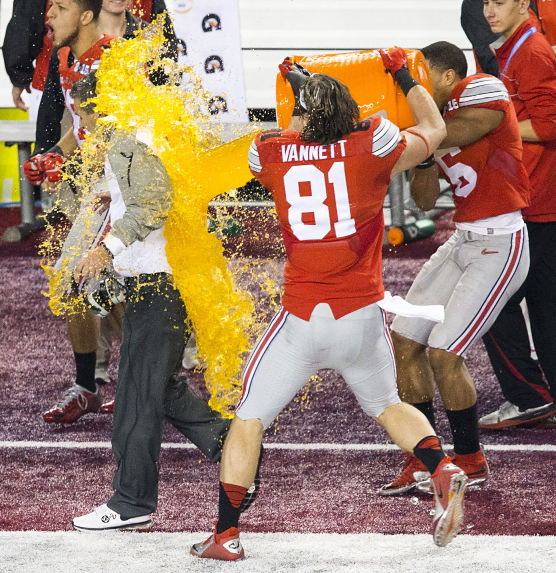 Ohio State Buckeyes head coach Urban Meyer can't escape a Gatorade bath from tight end Nick...