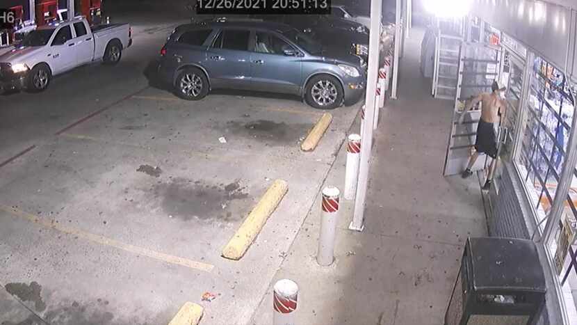 An image from surveillance video shows the gunman firing into the Texaco station Sunday,...