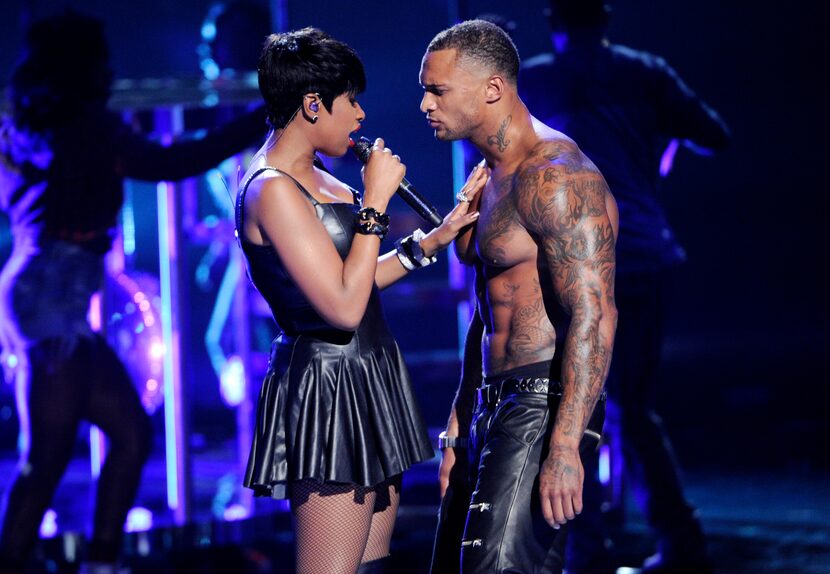 Jennifer Hudson, left, performs at the BET Awards at the Nokia Theatre on Sunday, June 29,...