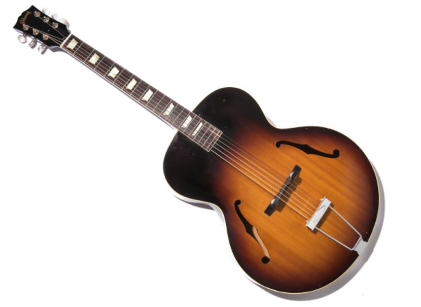 1957 Gibson L-50 arch-top acoustic guitar, priceless; private guitar lessons, $55 per hour...