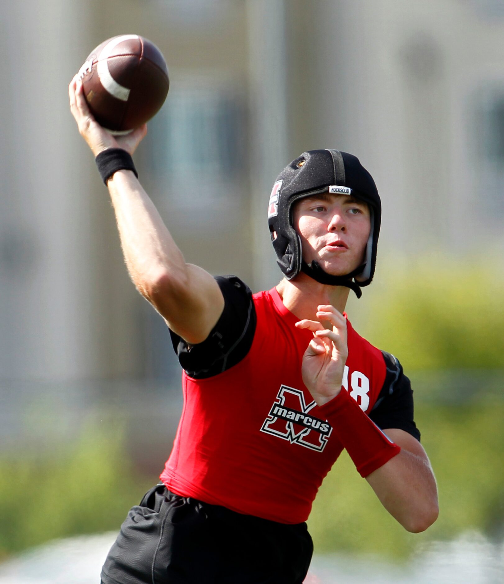 Flower Mound Marcus quarterback Cole Welliver (18) delivers a pass downfield during day 1...