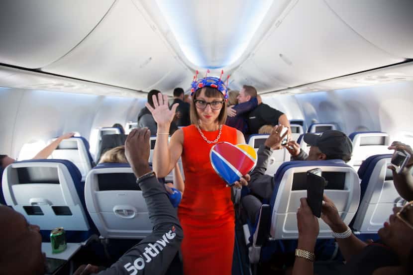 Southwest Airlines employees showed off the company's new uniform design during a flight...