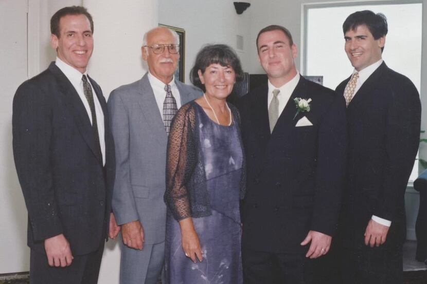 The Cuban family poses for a group portrait at Jeff Cuban's wedding. From left to right:...