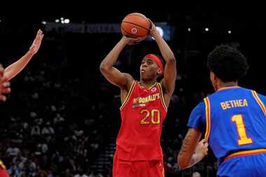 West guard Tre Johnson (20) hits a 3-pointer during the second quarter of the McDonald's...