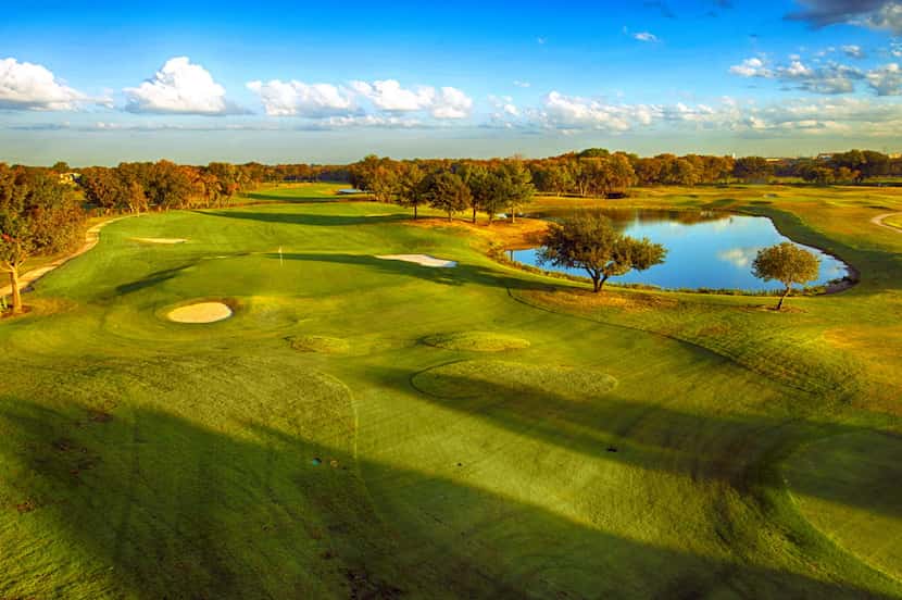 A view of the 585-yard par-5 No. 18 at the Golf Courses at Watters Creek in Plano from the...