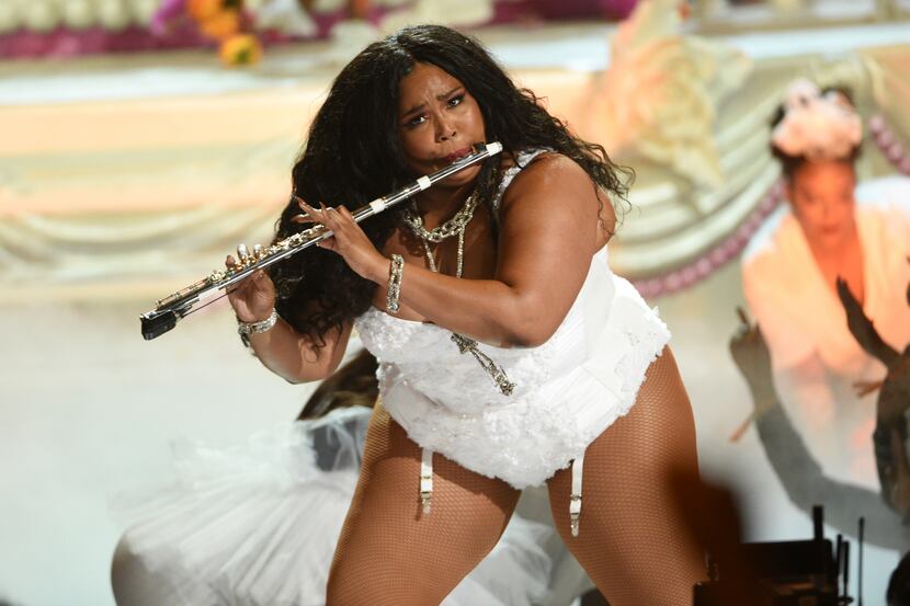 Houston-raised R&B singer-rapper Lizzo leads the pack with eight Grammy nominations.