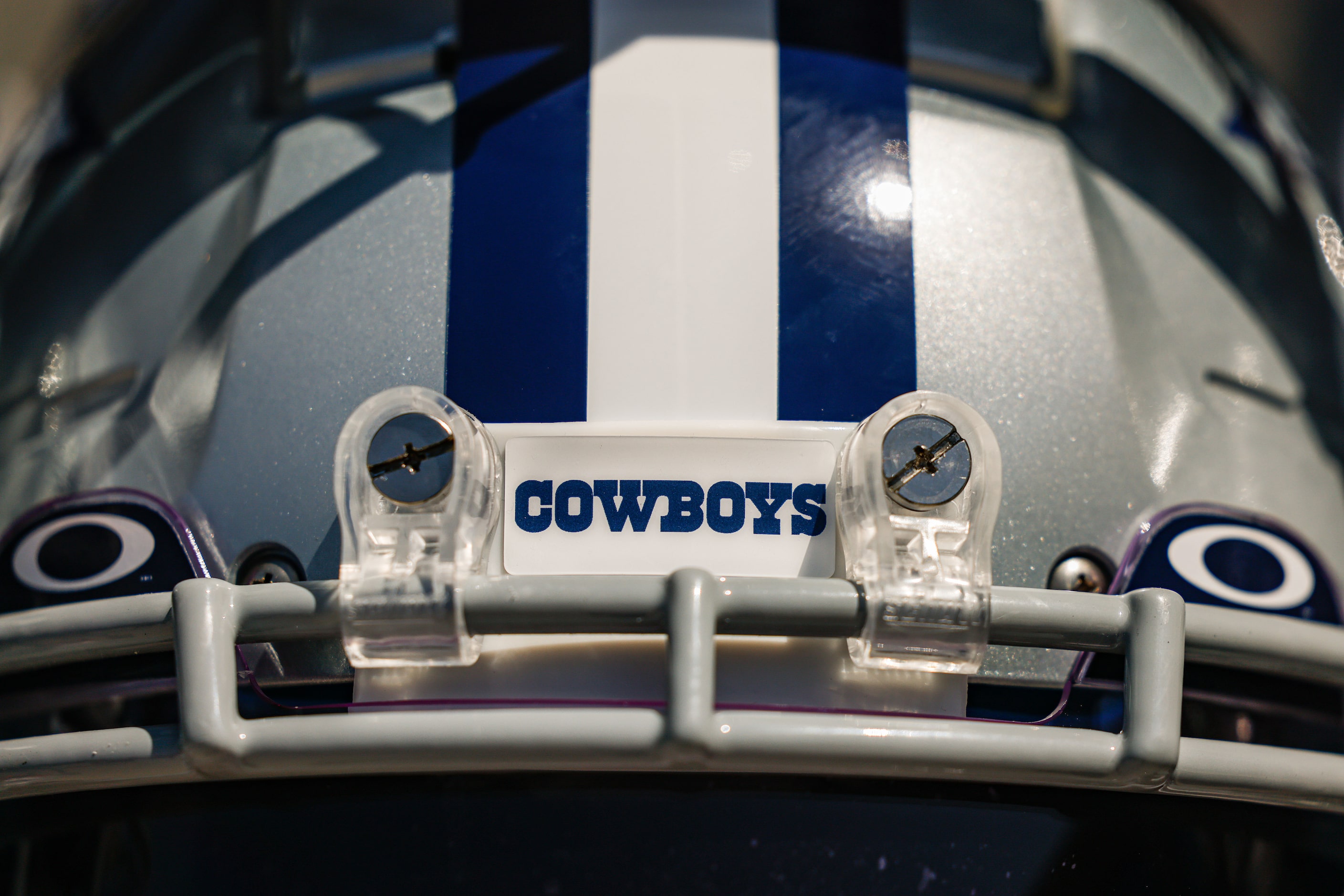 A Dallas Cowboys helmet rests on a shelf after a Cowboys rookie minicamp at The Star in...