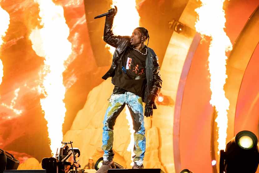 FILE - Travis Scott performs at the Astroworld Music Festival in Houston, Nov. 5, 2021. A...