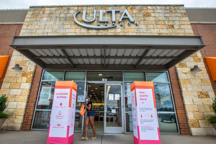A customer walks out of the Ulta Beauty store at The Shops at Park Lane in Dallas on...