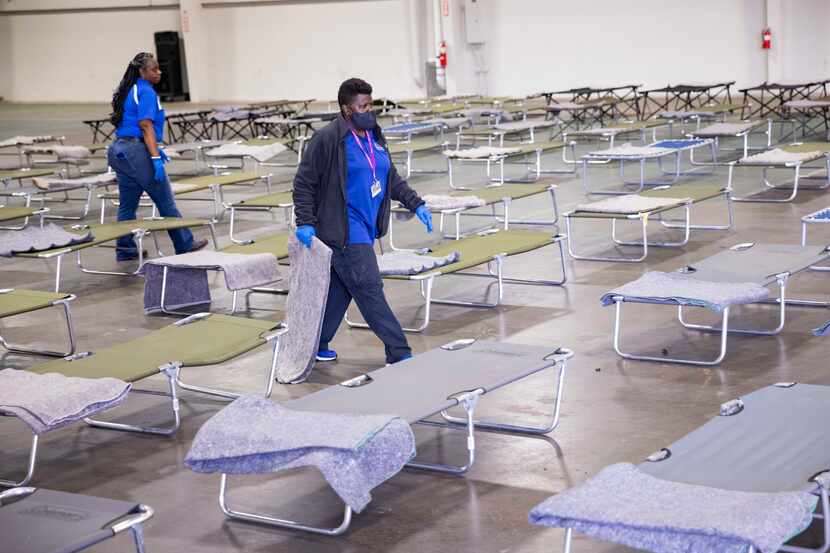 The City of Dallas' Office of Homeless Solutions sets up a temporary weather shelter in the...