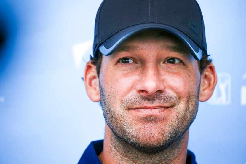 Former Dallas Cowboys quarterback Tony Romo talks to the media following  the first round of...