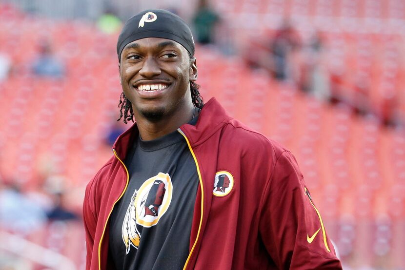 Sep 3, 2015; Landover, MD, USA; Washington Redskins quarterback Robert Griffin III (10)...