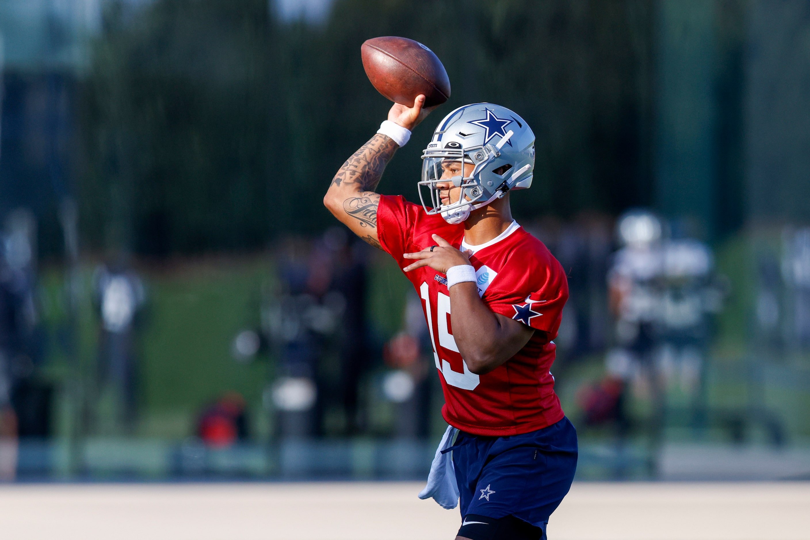 Dallas Cowboys quarterback Trey Lance (15) throws a pass during a practice at The Star,...