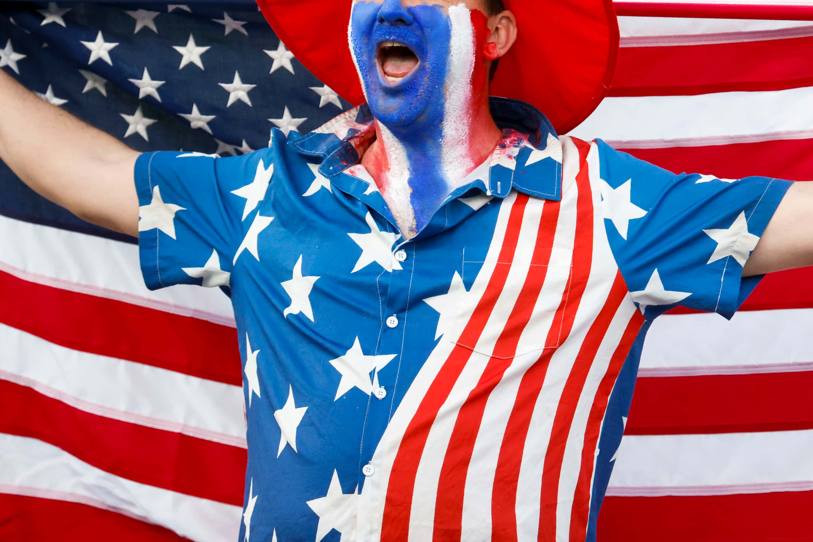 PJ Goedhals, of Houston area, wearing U.S themed outfit cheers during the men's T20 World...