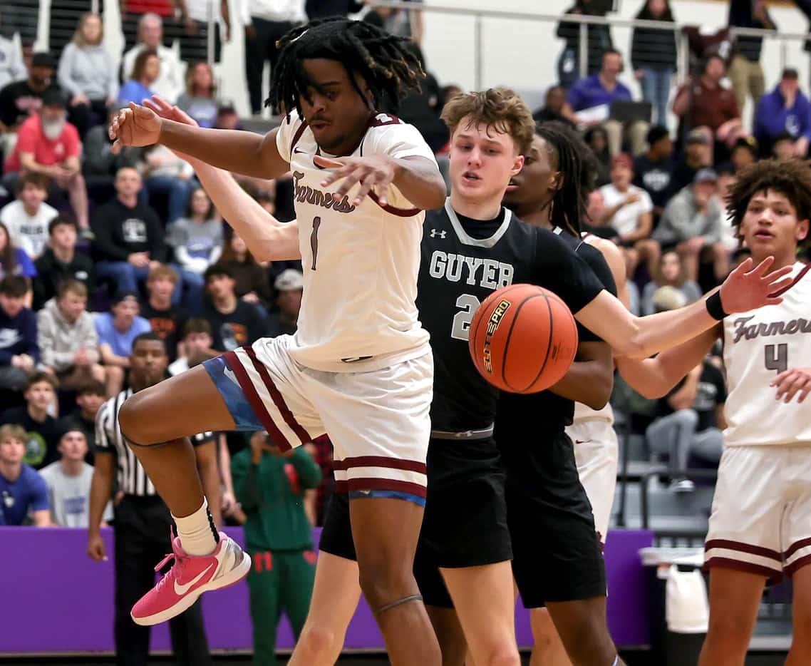 Lewisville guard Landon Brown (1) looses the ball against Denton Guyer forward Tucker...