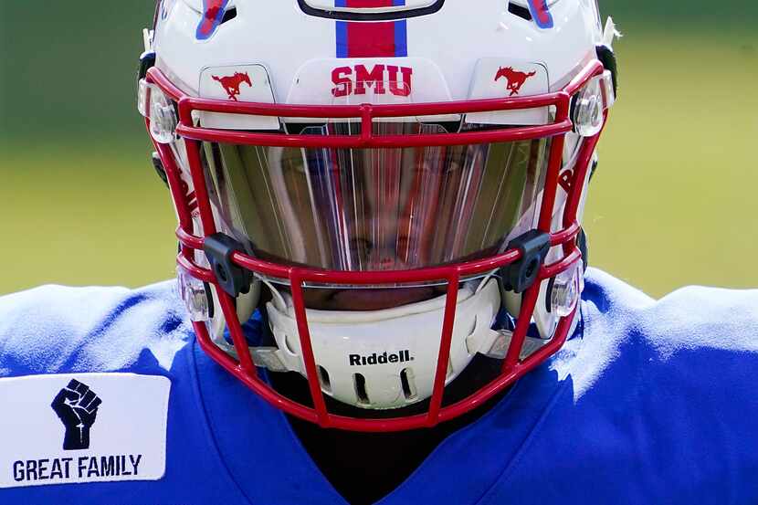SMU quarterback Terrance Gipson warms up before an NCAA football game against Memphis at...