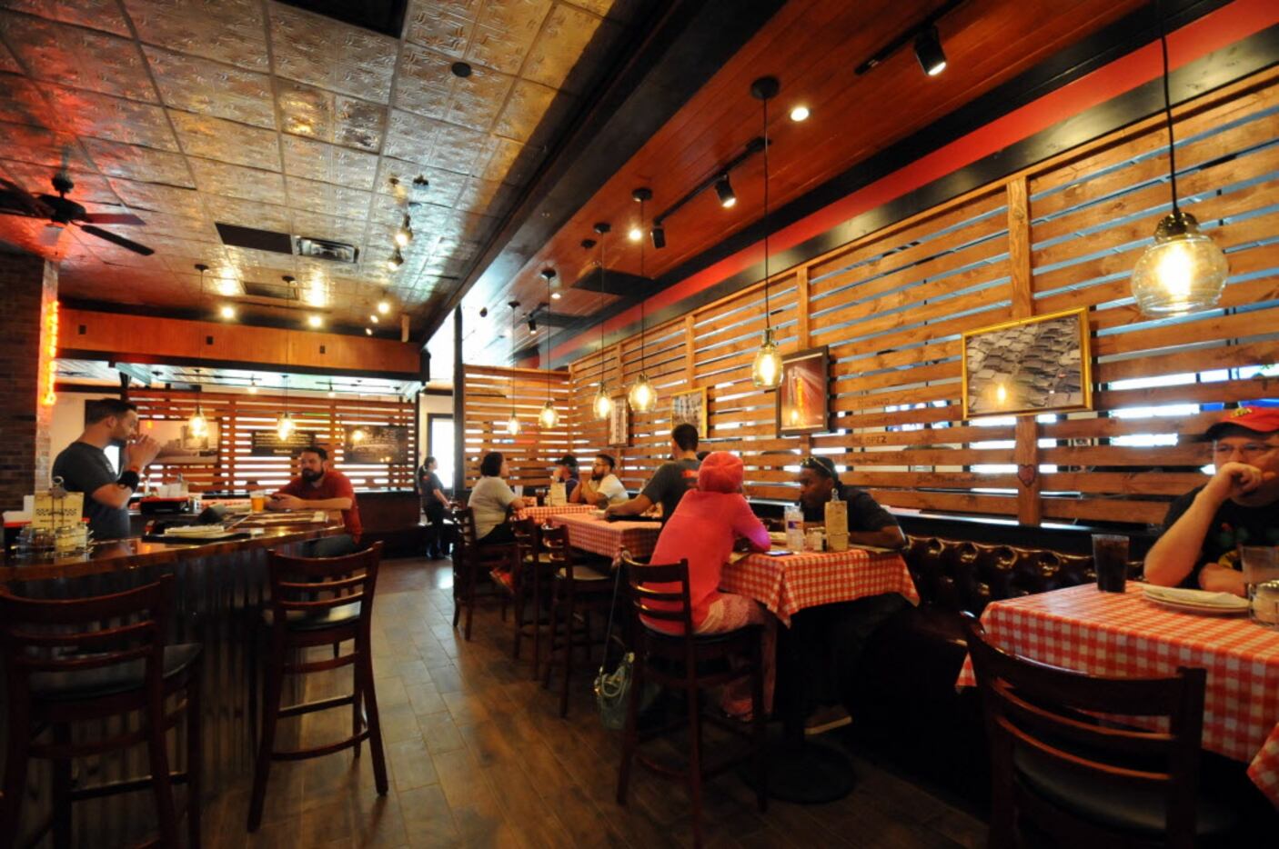 The restaurant serves specialty deep dish pizza, thin crust, salads and sandwiches at Gino's...