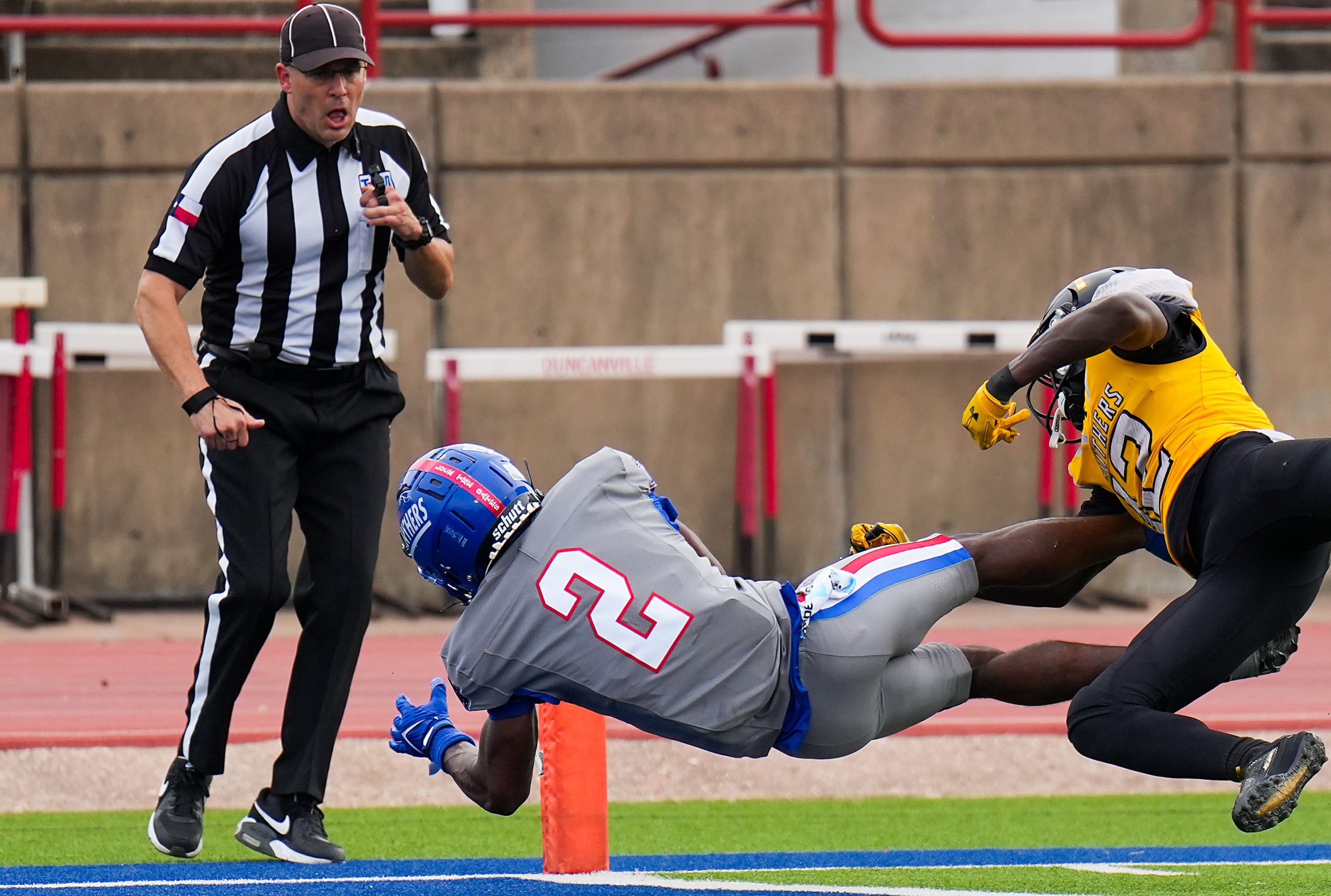 Duncanville wide receiver Ayson Theus (2) dives for a touchdown past St. Frances Academy...