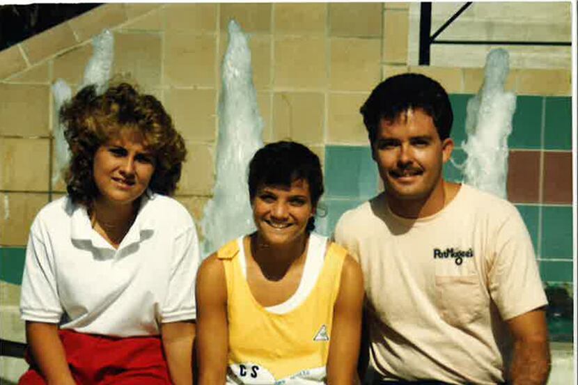 Traci Roberts and Laura Anton pose for a photograph with Tristan Longnecker during the 1986...