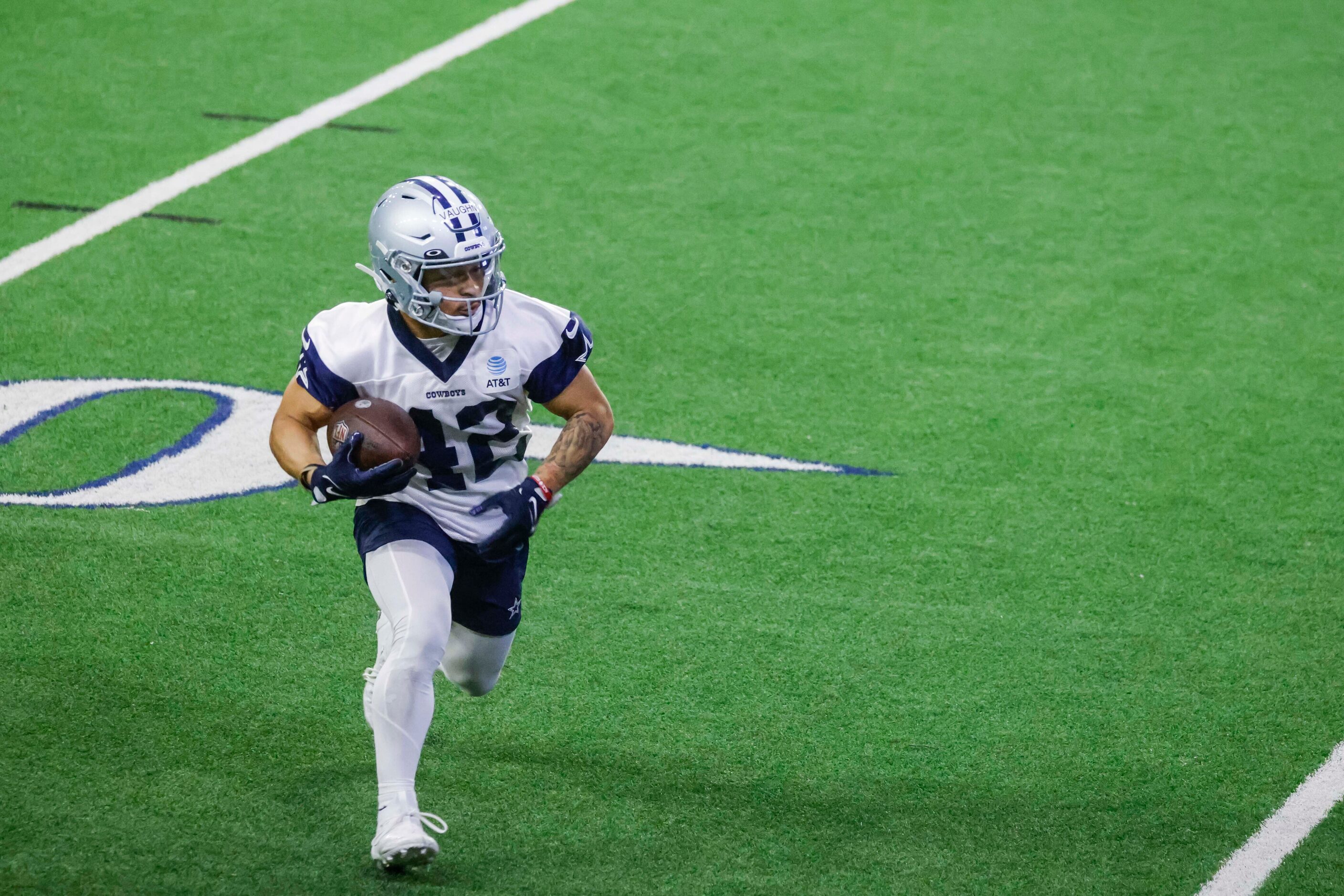 Dallas Cowboys running back Deuce Vaughn takes part during OTA practice on Thursday, May 25,...