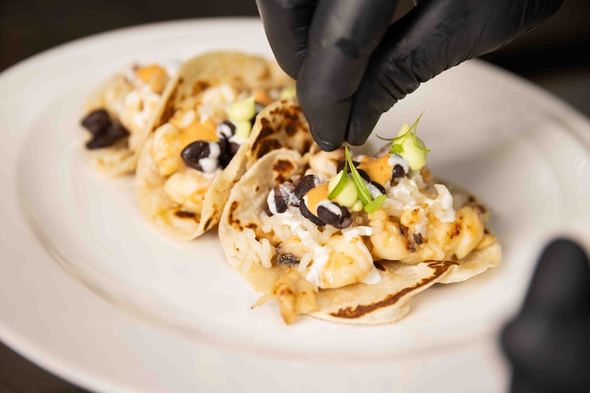 The Mexican chef de cuisine Rodrigo Lomelí prepares the Mexican Rosarito Taco, a flour...