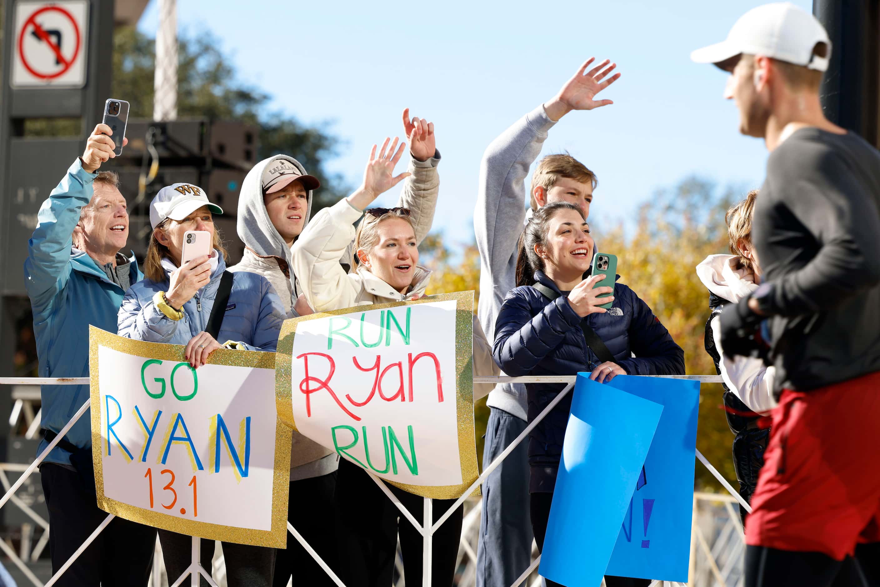 Crowd cheers for half marathon runners during 2023 BMW Dallas Marathon on, Sunday, Dec. 10,...