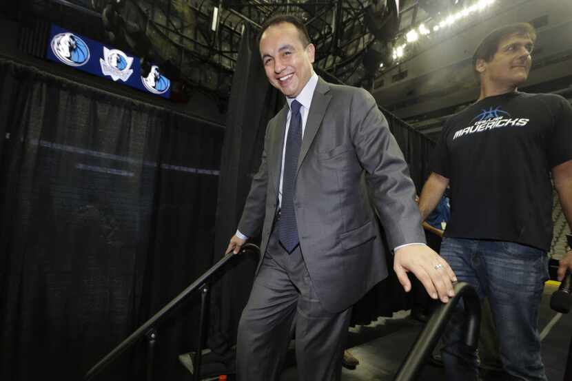 FILE - In this Aug. 15, 2013, file photo, Dallas Mavericks general manager Gersson Rosas...