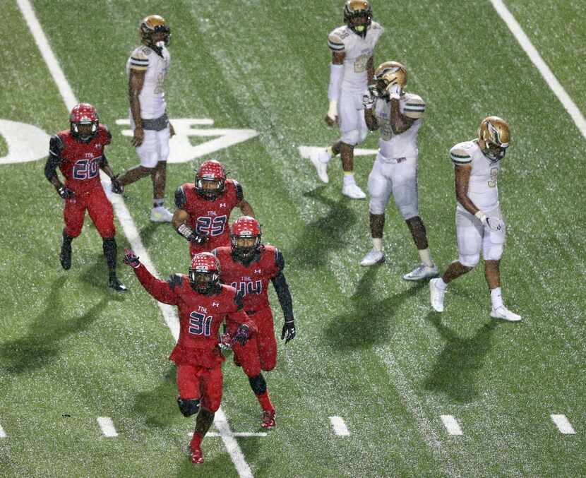 Cedar Hill's Kolbi McGary (31) after successfully getting a first down on a fourth down punt...