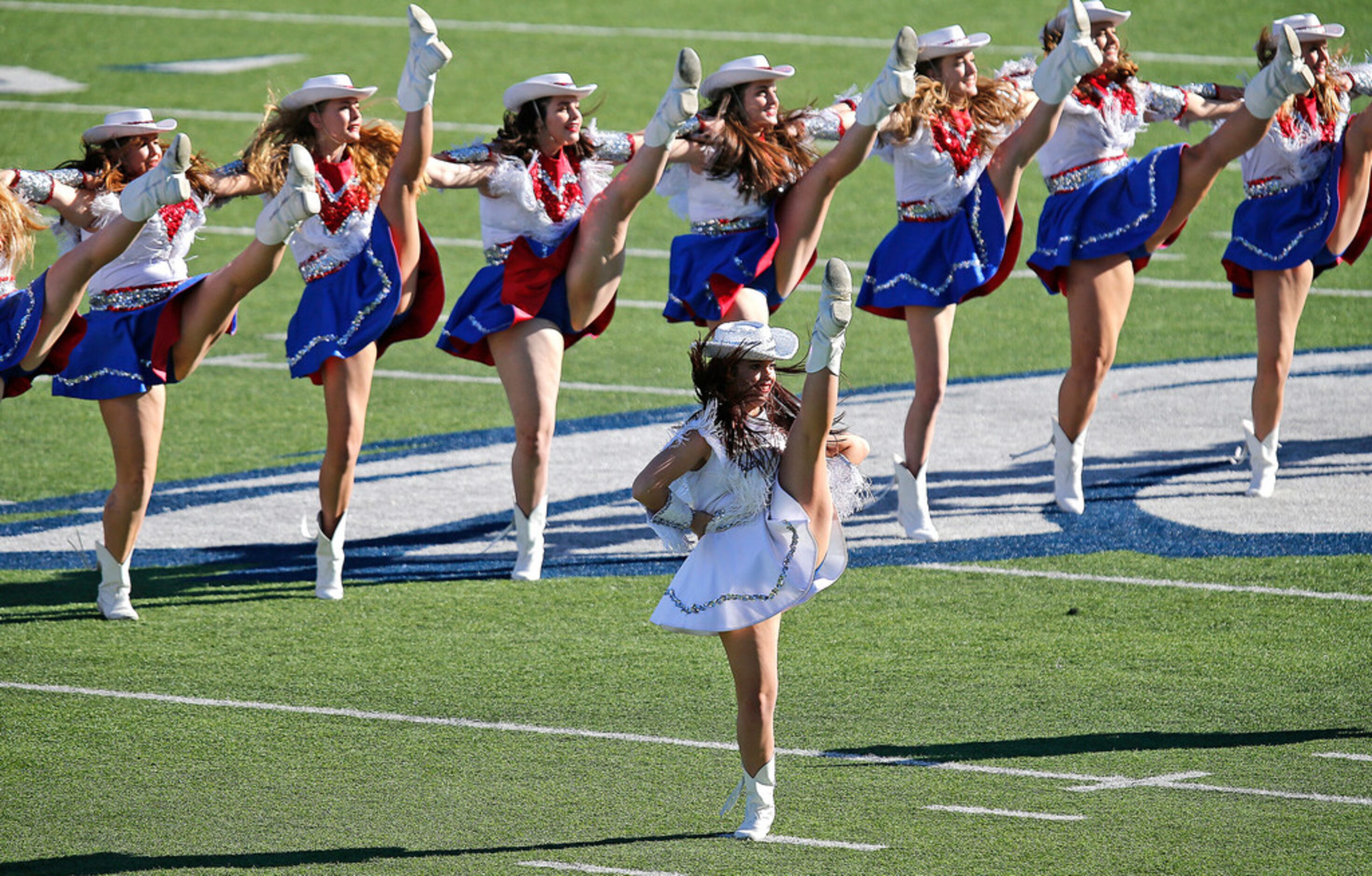 The Pearce High School Pacesetters drill team perform during the half time as Pearce High...