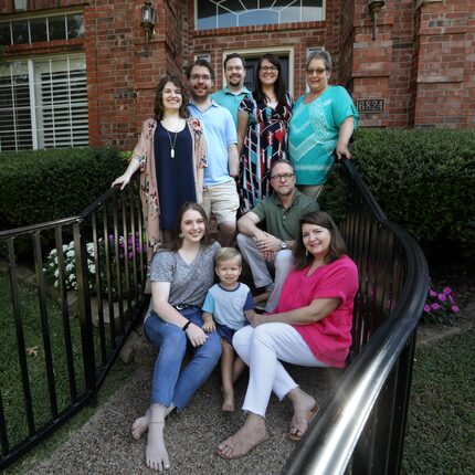 The Cary family adults — Jessica Cary (clockwise from back left) and her husband, Trenton;...