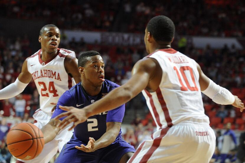Kansas State Wildcats guard Marcus Foster (2) handles the ball against Oklahoma Sooners...