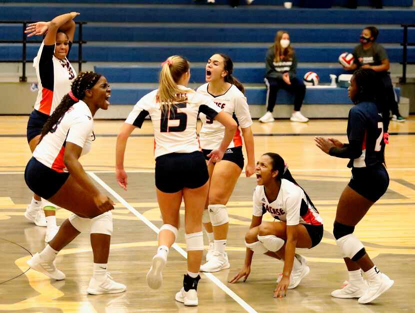 Sachse High School celebrates scoring a crucial point during game three as Sachse High...