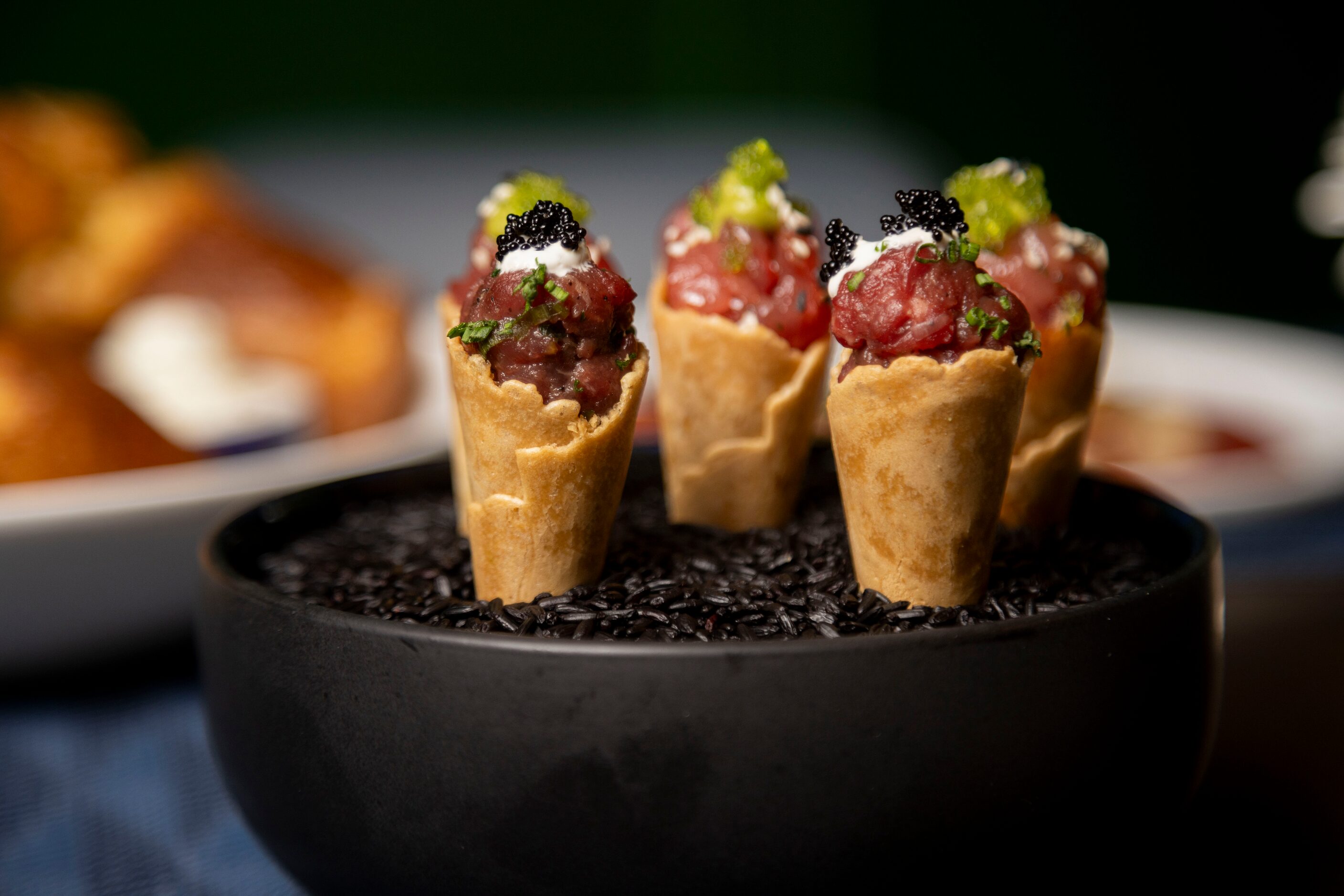 Steak and Tuna Tartare Cones are on the menu at Wicked Butcher in Dallas.