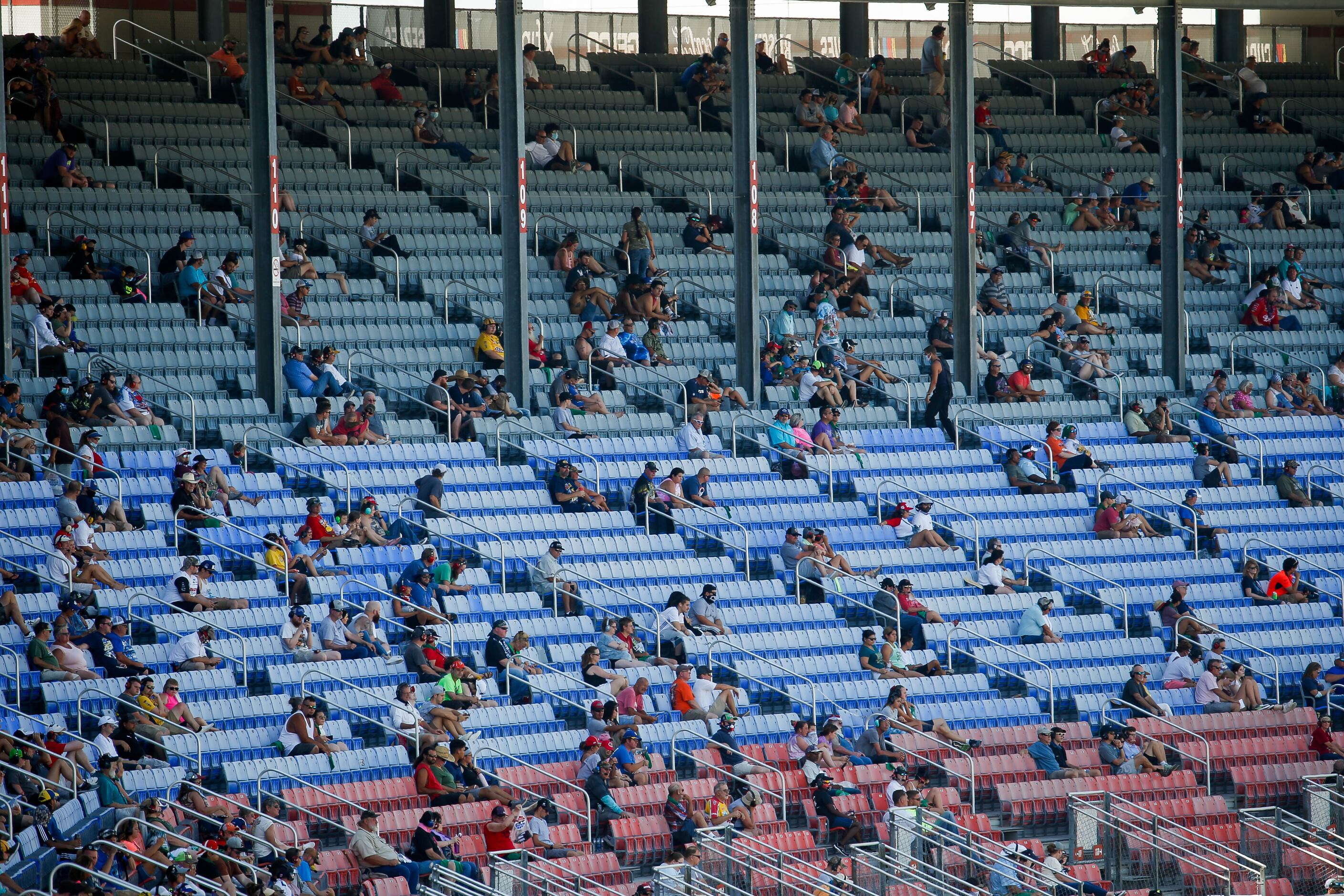 Spaced out fans watch the NASCAR Cup Series O'Reilly Auto Parts 500 race on July 19, 2020 at...