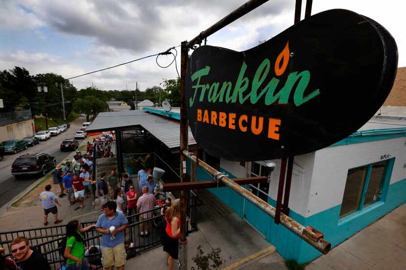 Long lines form outside Franklin Barbecue in Austin, Texas, Wednesday, April 17, 2013 during...